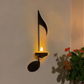 Candlestick with musical notes