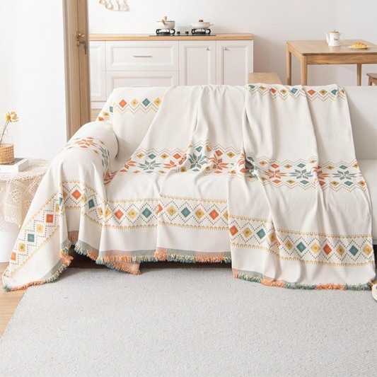 Dwustronny pokrowiec na sofę w stylu bohemy z frędzlami